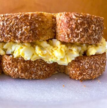 Garlicky Egg Salad Sandwich on a plate 2