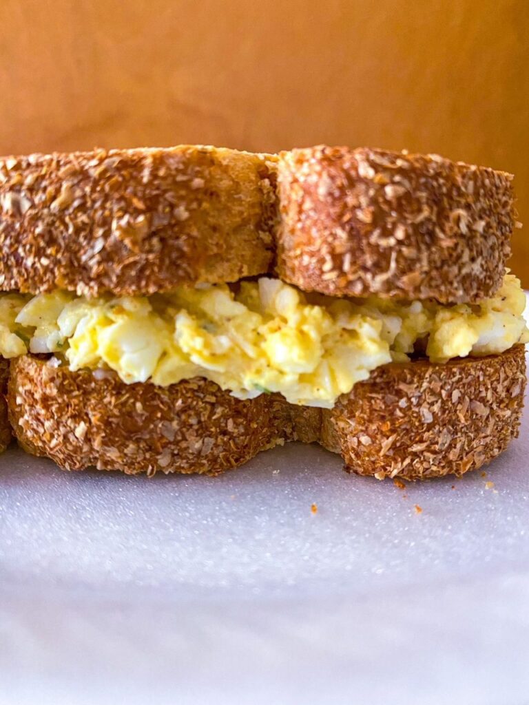 Garlicky Egg Salad Sandwich on a plate 2