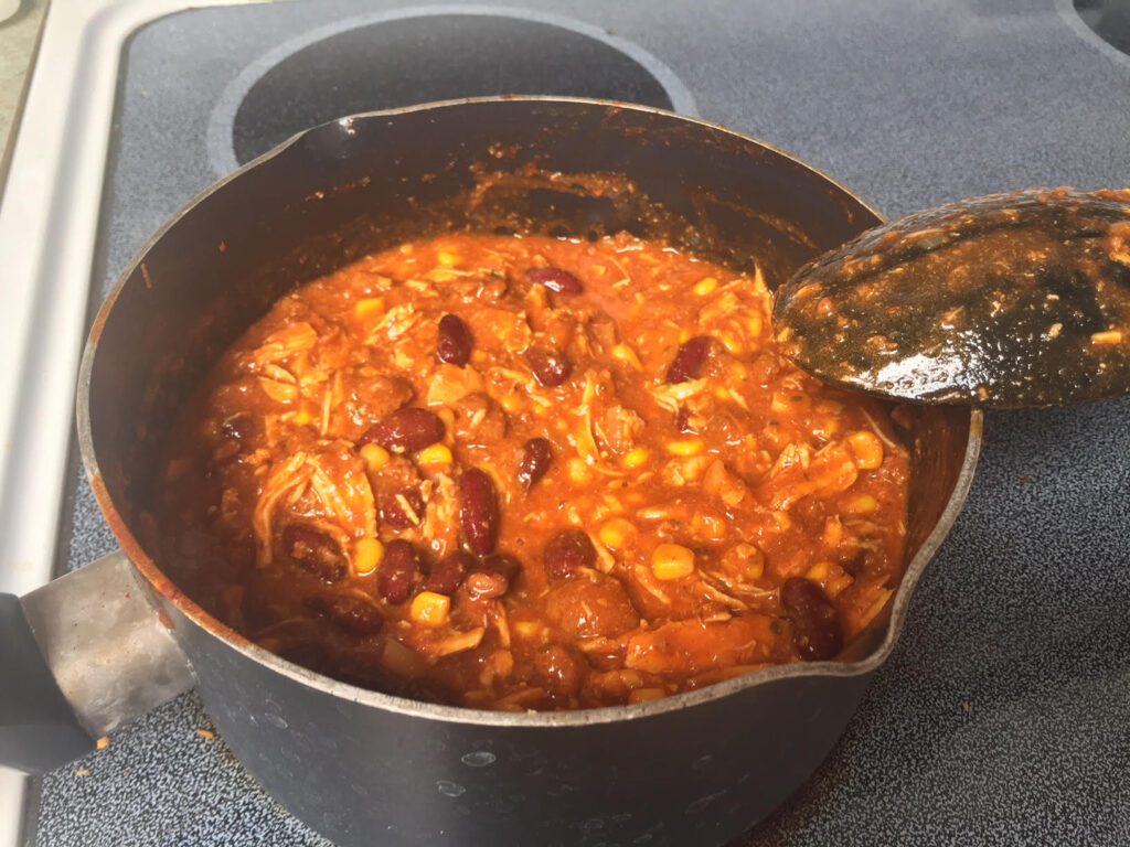 red chicken chili in the pot