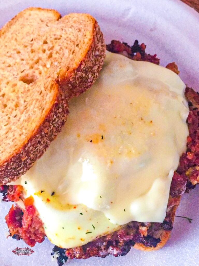 Corned Beef and Eggs Sandwich overview with swiss cheese