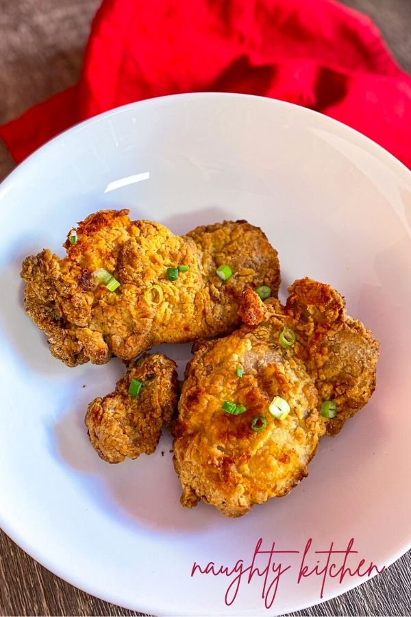 Airfryer chicken in a white serving bowl 