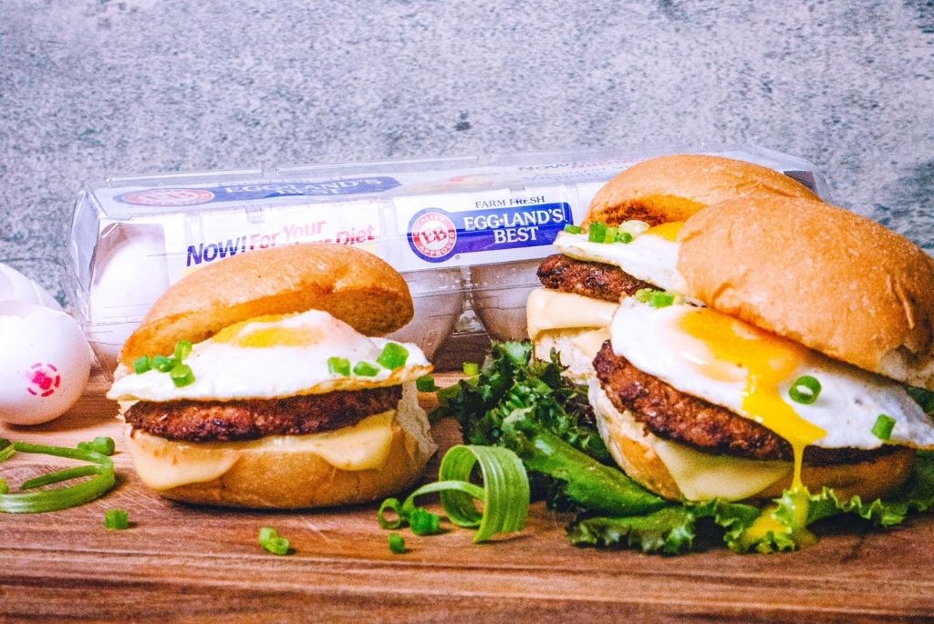 longanisa & fried egg sandwichs on cutting board