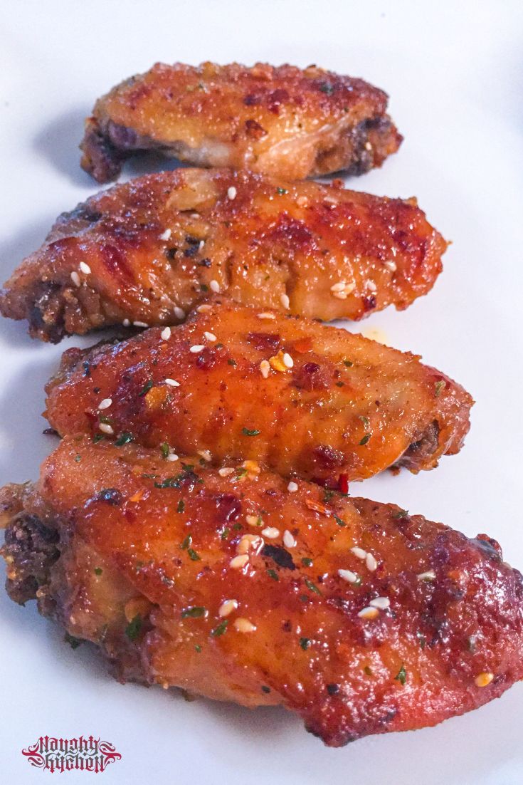 Peanut Butter Chicken Wings on white plate