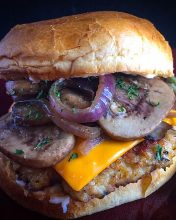 chicken cheese burger with grilled mushrooms and onions