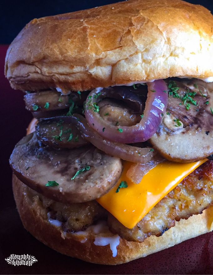 chicken cheese burger with grilled onions and mushrooms