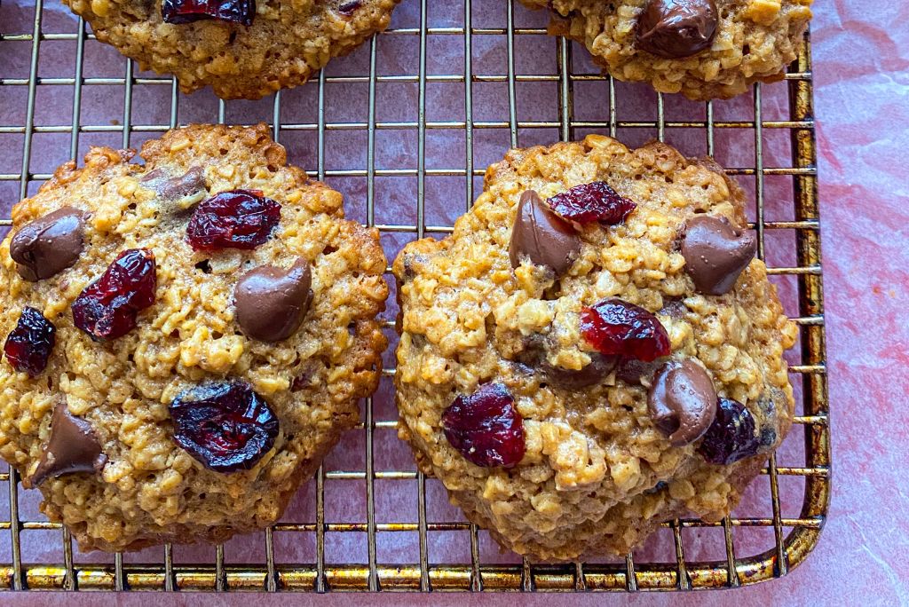 Oatmeal Craisin Chocolate Chip Cookies on a rack