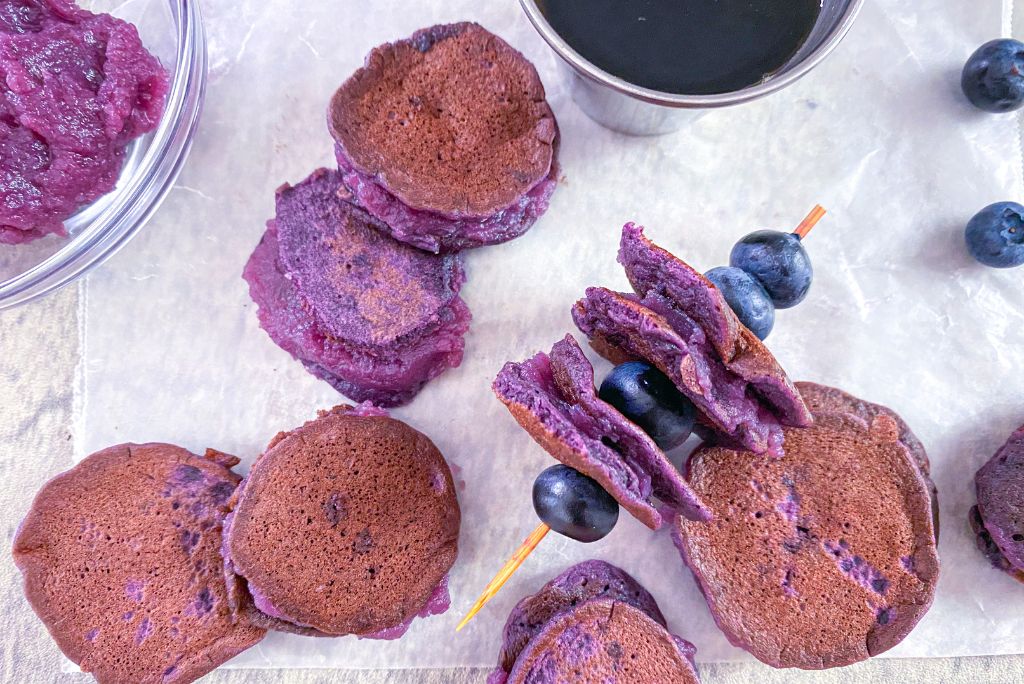 Ube Pancake Coins with maple syrup and ube halaya