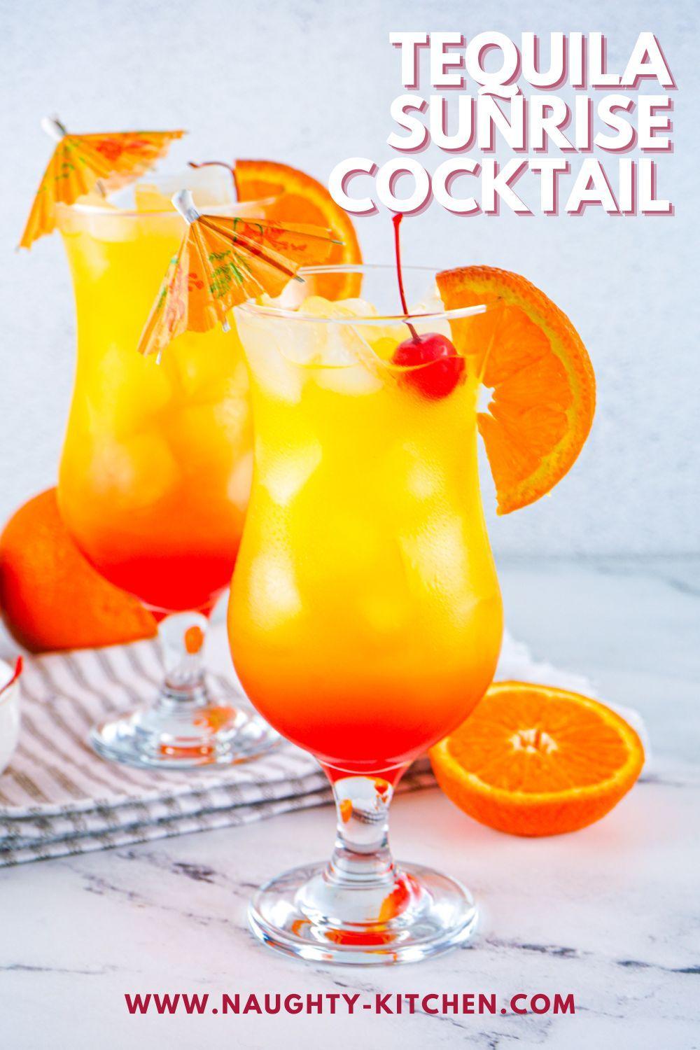 Two Tequila Sunrise Cocktail glasses with cherry and orange slices on top.