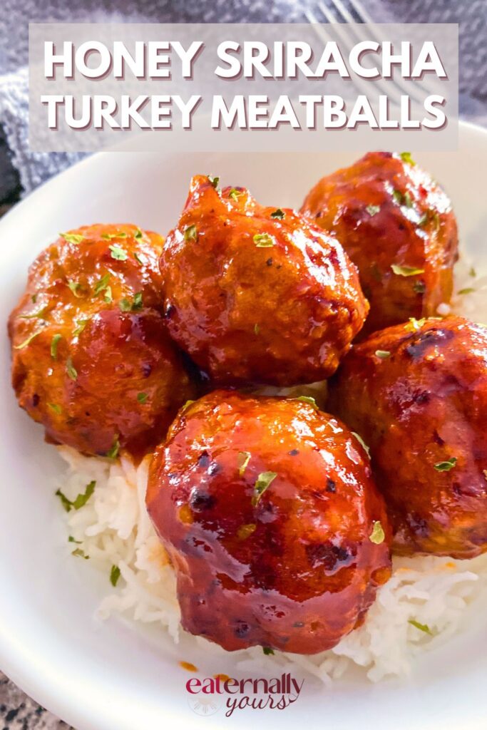 Honey sriracha turkey meatballs with white rice in a bowl.