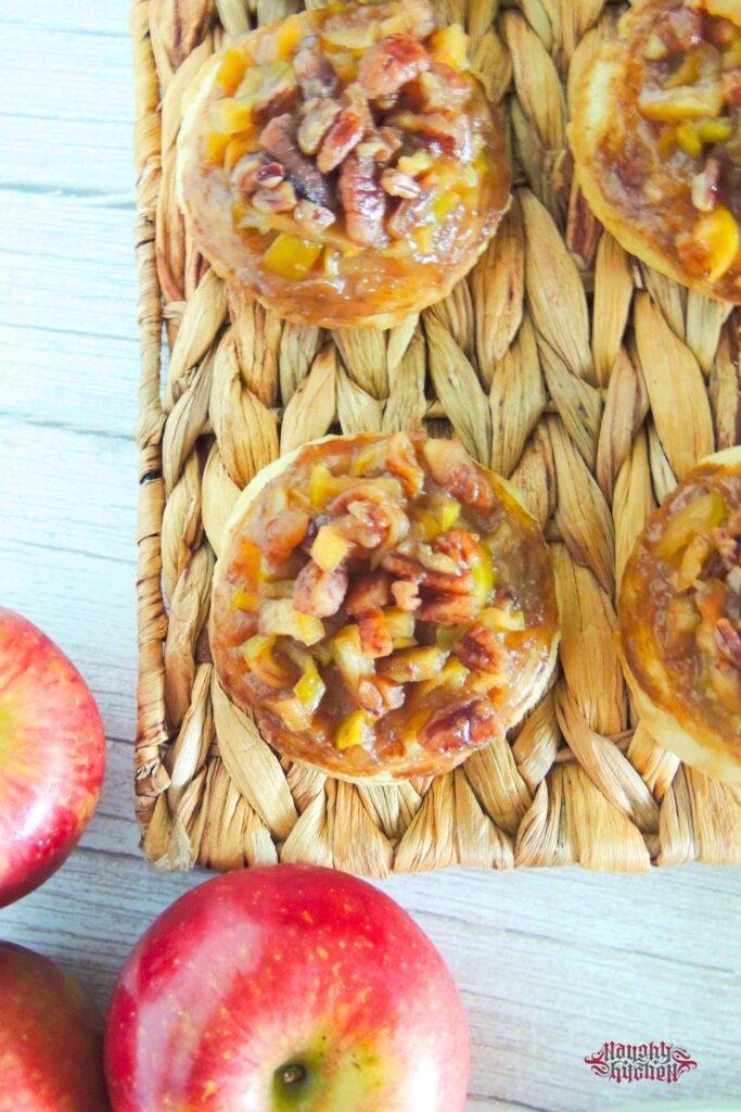 Upside Down Caramel Apple Biscuits with red apples.