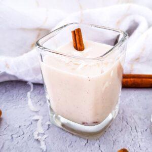 Coquito in a shot glass.