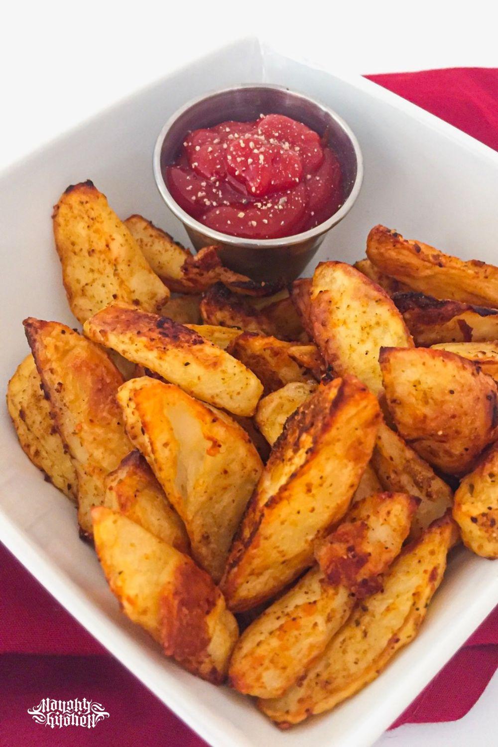 oven roasted red potato wedges with sriracha banana ketchup.