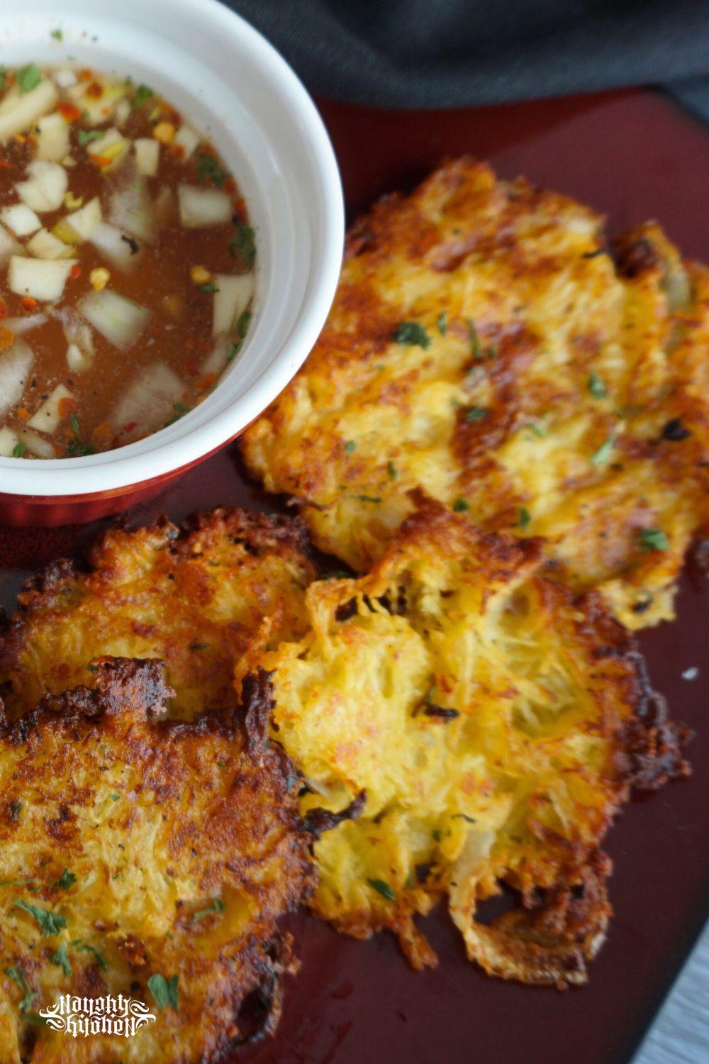 Low Carb Spaghetti Squash Fritters on red plate.