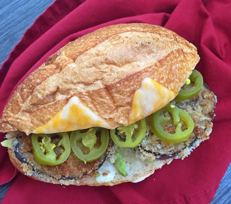 Crispy Eggplant Sandwich with jalapenos and melted cheese.