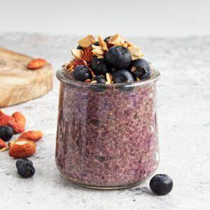 Blueberry Chia Pudding in a glass jar.