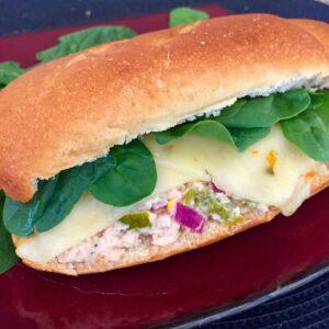 Jalapeno Tuna Melt on a red plate.