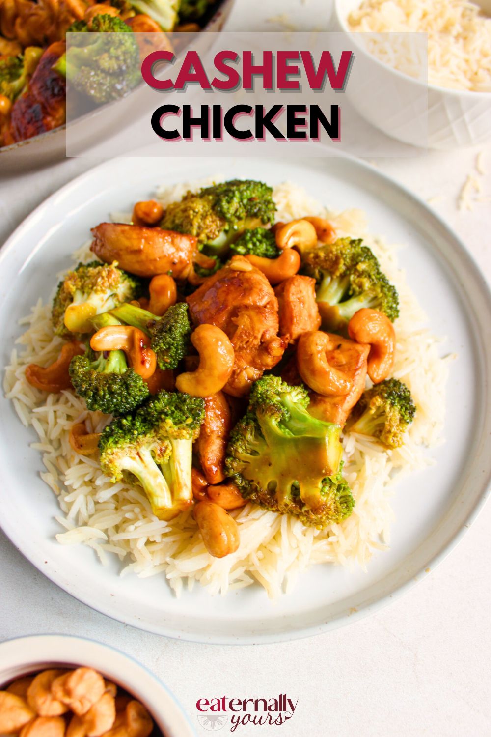 Cashiew Chicken with broccoli and white rice in a white plate.