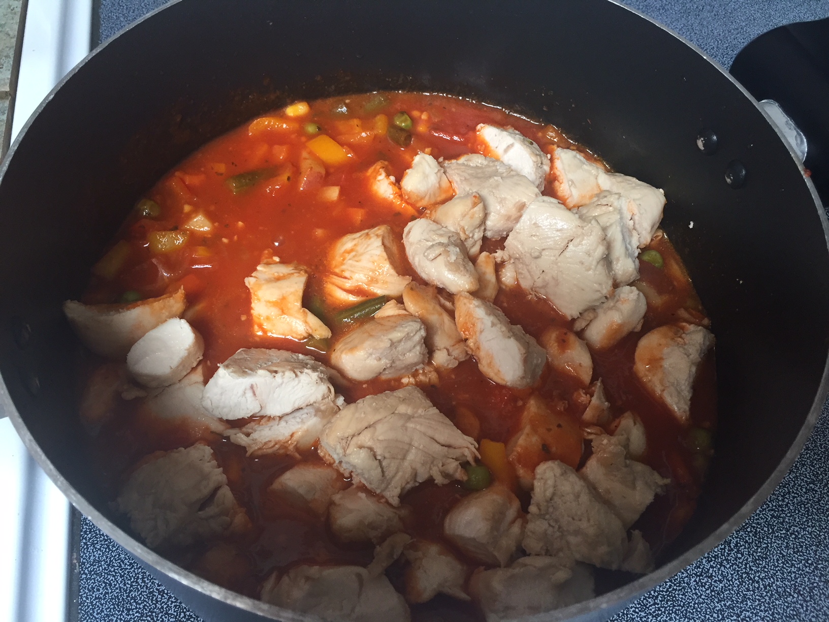 Chopped chicken in afritada sauce.