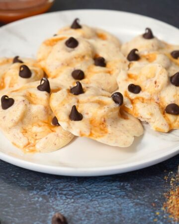 Protein yogurt banana clusters frozen with chocolate chips and caramel drizzle