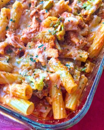 Creamy chicken pasta bake with melted cheese and golden crispy topping