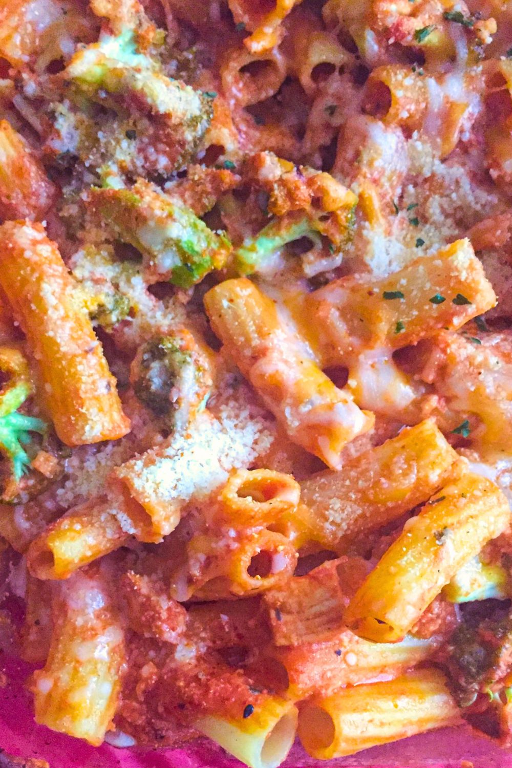 Homemade chicken pasta bake with Swiss cheese and rich tomato sauce